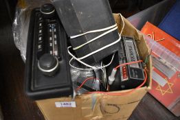 A small selection of vintage car audio parts including a Temple cassette player, unnamed car radio