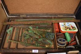 A home made wooden box of 1950's Meccano, parts, wheels, cogs etc