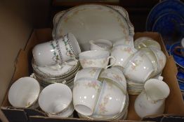 A Tuscan China part tea service in white with black architectural design to edges and leaf swag
