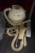 A rare 1950s Hoover 'Constellation' in mint green with accessories, in working order.