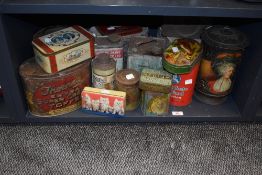 An assorted collection of novelty advertising and other tins, to include a Player's Navy Cut tin,
