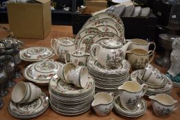 A quantity of Johnson Brothers Indian Tree patterned tableware, to include lidded tureens, dinner