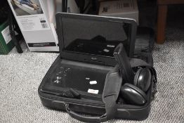A Bush 12'' portable DVD player, with microphone, headphones, and case