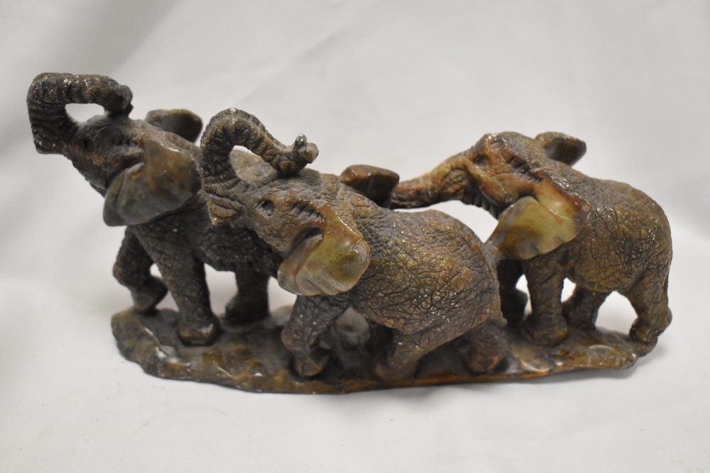 Two 20th Century stone carved and textured rhinoceros and elephant ornaments, the largest - Image 3 of 4