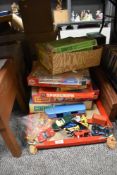 An assorted collection of vintage games, toys, and diecast, to include boxed Subbuteo football