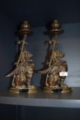A pair of good quality mid-late 19th Century French cast bronze candlesticks, in the form of