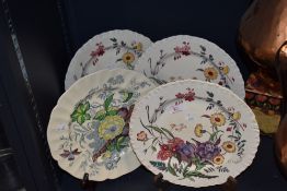 A group of three Wedgwood transfer printed plates, of botanical designs, decorated with Ranunculus