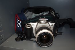 A Canon EOS300 camera No5165506 with Canon Zoom lens EF 28-90mm 1:4-5,6 in soft camera case with