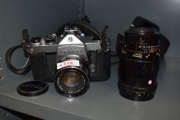 An Asahi Pentax SP500 camera No3358056 with Suoer-Takumar 1:2/55 lens No 6357799 and Tamron Twin
