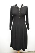 A late 1930s/40s day dress in black seersuker crepe cut on the bias, giving a lovely clingy fit,