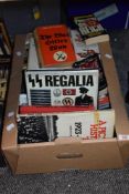 A box of World War related reading material, including 'A Pictorial History of The SS (1923-