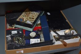 A collection of miscellaneous costume jewellery and wristwatches, and a