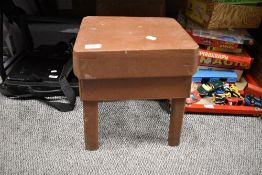 Three rustic wooden stools, finished in brown, 34cm tall