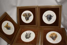 A group of five Boehm porcelain mounted plaques, illustrated with 'The Big Five' animal portrayals