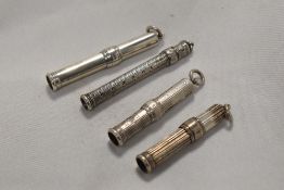 Four hallmarked silver retractable pencils by S Morden