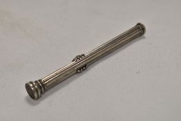 A hallmarked silver retractable pen/pencil by S Morden