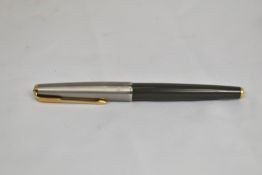 A Parker 61 fountain pen in navy grey with lustalloy cap. In very good condition