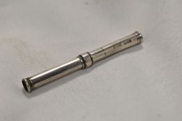 A combination hallmarked silver retractable pencil and dipping pen by S Morden & Co
