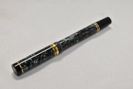 A Parker Duofold International converter fill fountain pen in green marble with one broad and one