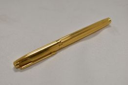 A Parker 75 Milleraise cartridge fountain pen, gold plated having Parker 14k nib. In very good