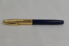 A Sheaffer Imperial cartridge/converter fountain pen in blue having gold filled cap and white spot