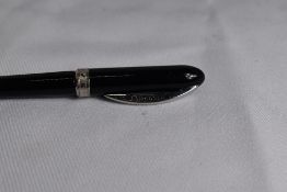 A Visconti Firenze small ballpoint pen in black marked Visconti to clip and band, in original box