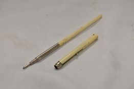 A bone handled retractable dipping pen and propelling pencil