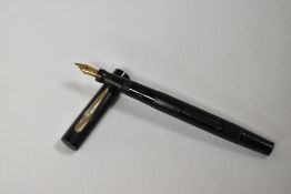 A Mabie Todd & Co Swan SM1/60 leverfill fountain pen in black having a Swan 1 nib. Good clean