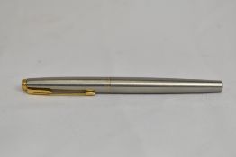A Parker 75 cartridge converter fountain pen in lustalloy with gold trim. In excellent condition