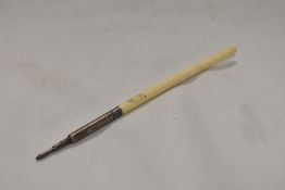 A Sterling Silver and bone retractable propelling pencil
