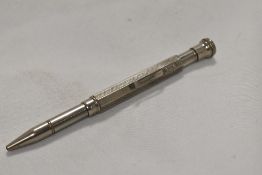 An unusual retractable pencil with sliding hexagonal feed