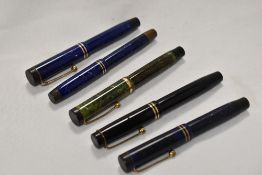 Five Parker Jr button fill fountain pens including Stremline and Lucky Curve in blue, lapis, jade