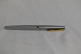 A Sheaffer Stylist cartridge fountain pen in brushed steel with gold clip and white dot having