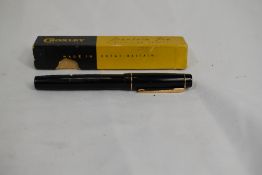 A boxed Croxley lever fill fountain pen in black with single narrow band to cap having Dickenson