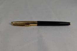 A Waterman Converter Fill fountain pen in black with with rolled gold cap having 14ct nib. Good