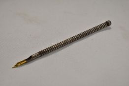 A Sterling Silver dipping pen of threaded design by S Mordan
