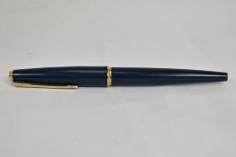 A Parker 45 Deluxe cartridge converter fountain pen in blue. In very good condition