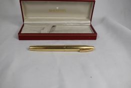 A Sheaffer Imperial 777 12k gold filled fountain pen with white spot to clip having Sheaffer 14k