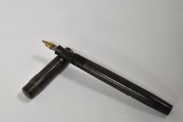 A Mabie Todd & Co Blackbird leverfill fountain pen in black hard rubber having Blackbird nib. In
