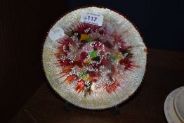 A Limoges enamelled bowl, by J.Betourne, having a multi-coloured radiating design, with a diameter