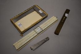 A vintage A G Thornton Ltd slide rule, a set of Draper feeler gauges, a E Preston & Sons wood and