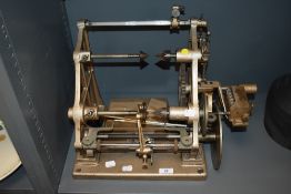 A vintage automatic coil winder, 'The Douglas Automatic Winder'.