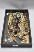 A selection of costume and decorative jewellery necklaces, bracelets, watches, etc