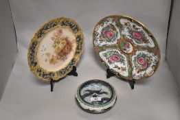 A Chinese cloisonne enamelled bowl, 14cm diameter, together with two decorative plates, comprising a