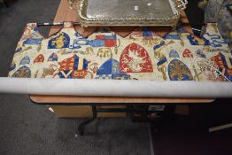 A vintage fabric window blind, decorated with a French heraldic design, 104cm wide