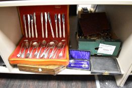 A cased canteen of Oneida silver plated cutlery, another oak cased canteen of cutlery, and other