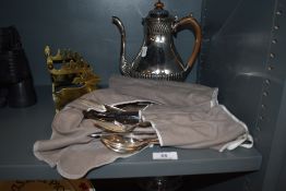 A selection of plated cutlery, including Arthur Price, a brass serving rest etc.