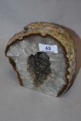 A large geode with polished face.
