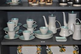 A selection of Poole Pottery table ware in grey and mint green colourway.