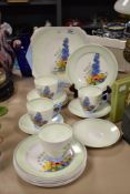 A Shelley Art Deco design tea set, decorated with colourful flowers